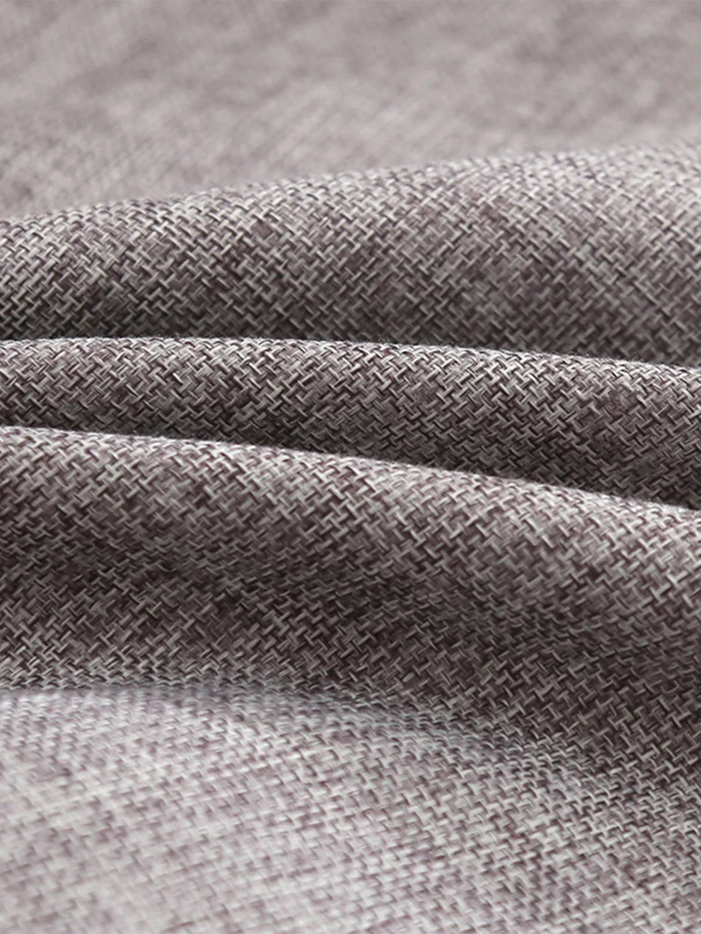 Tela texturizada gris claro para accesorios de hogar modernos, close up del tejido
