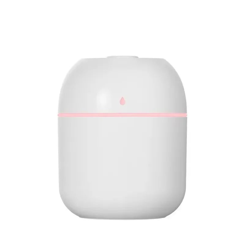 Humidificador blanco de diseño moderno para hogar, con luz LED rosa y símbolo de gota.