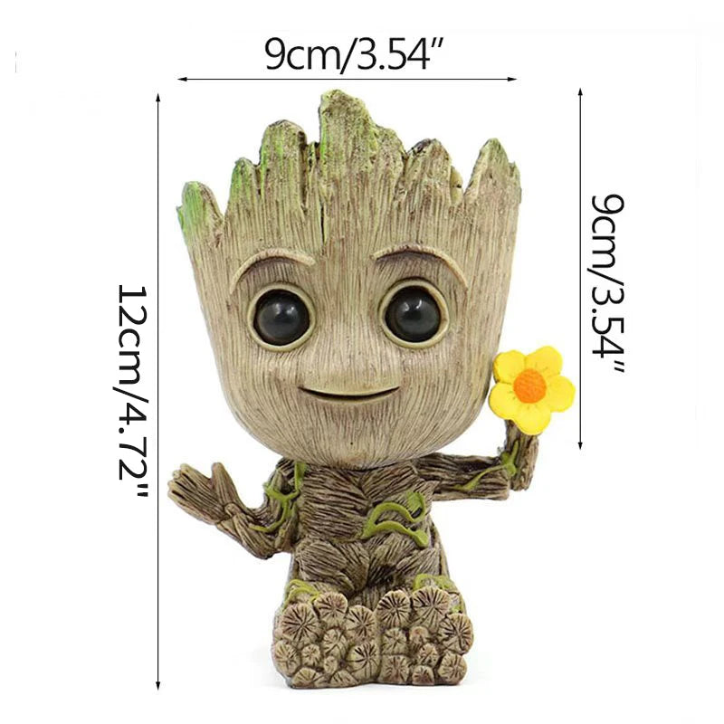 Maceta decorativa en forma de figura infantil de árbol con flor amarilla, 12x9cm, ideal para hogar moderno.