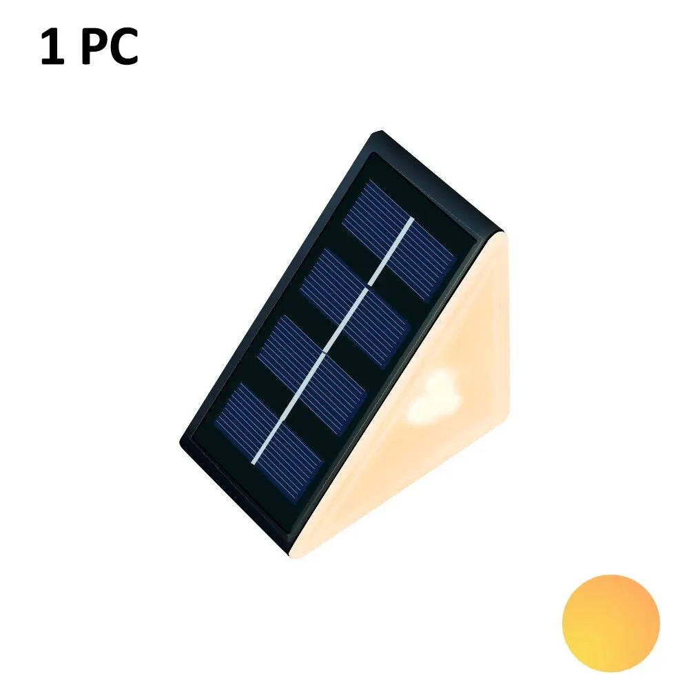 Lámpara LED solar de pared color negro, luz cálida, ideal para iluminación exterior moderna.
