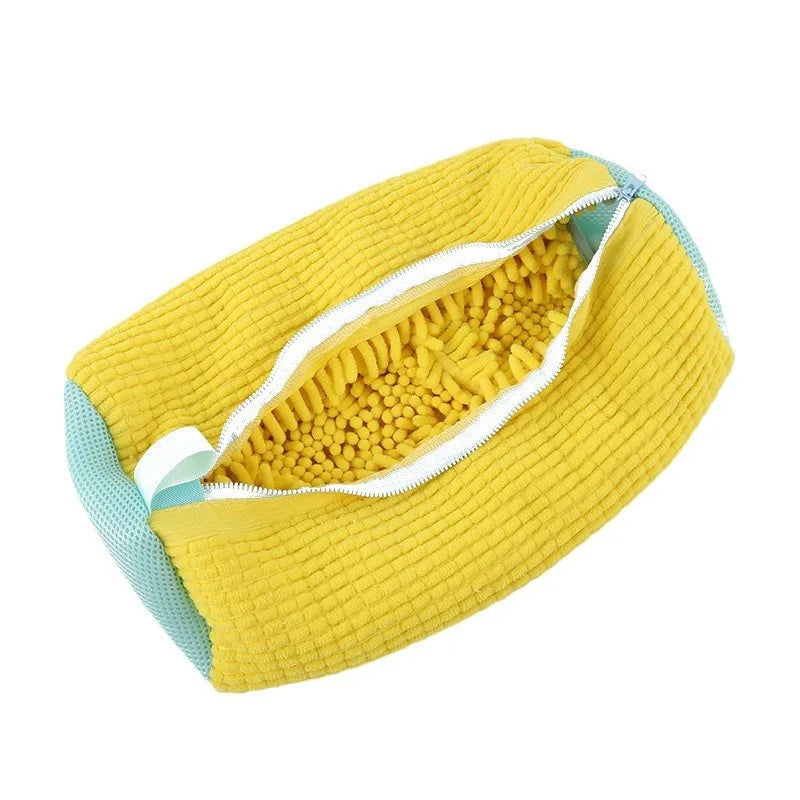 Guante limpiador de microfibra amarillo para limpieza del hogar con cremallera visible